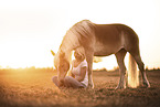 woman and Haflinger horse