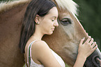 woman and Haflinger horse