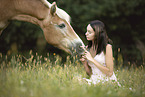 woman and Haflinger horse