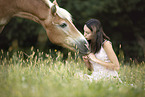 woman and Haflinger horse