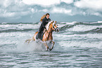 woman and Haflinger horse