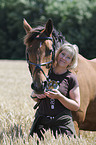 woman and Hanoverian horse