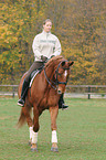 woman rides Hanoverian