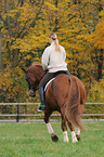 woman rides Hanoverian