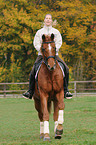 woman rides Hanoverian