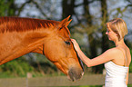 woman with Hanoverian horse