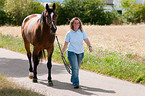 woman with Hanoverian horse