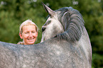 woman with Hanoverian horse