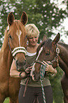 woman with 2 horses
