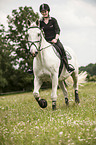 woman rides Hanoverian