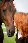 young woman with Hannoveraner Horse