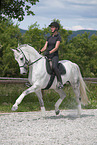 woman rides Hanoverian Horse