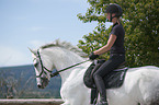 woman rides Hanoverian Horse