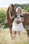 woman with Hanoverian Horse and Chihuahua