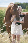 woman with Hanoverian Horse and Chihuahua