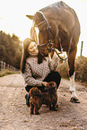 woman with Hanoverian and Havanese