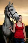 woman and hessian warmblood