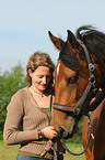 woman and Holsteiner horse