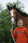 boy woth Holsteiner horse