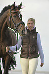 woman with Holsteiner warmblood