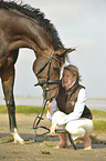 woman with Holsteiner warmblood