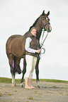 woman with Holsteiner warmblood