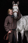 woman and Holstein Horse