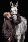 woman and Holstein Horse