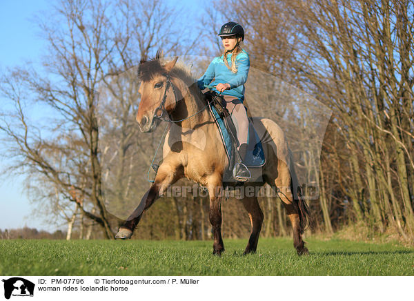 woman rides Icelandic horse / PM-07796