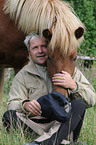 man with icelandic horse