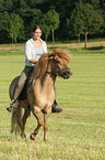 woman rides Icelandic horse