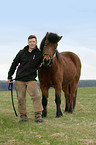 man and Icelandic horse