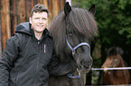 man and Icelandic horse