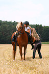 girls and Icelandic horse