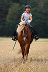 girl rides Icelandic horse