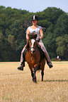 woman rides Icelandic horse