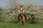 woman rides Icelandic horse