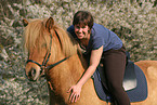 woman rides Icelandic horse