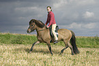 woman rides Icelandic horse