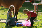 girls and Icelandic horse