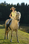 woman rides Icelandic horse