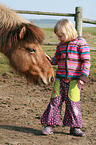 child and Icelandic horse