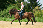 woman rides Icelandic horse