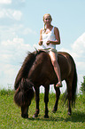 woman rides Icelandic horse