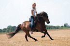 woman rides Icelandic horse