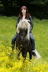 woman rides Icelandic horse