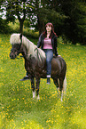 woman rides Icelandic horse