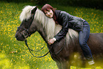 woman rides Icelandic horse