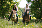 women rides Icelandic horses