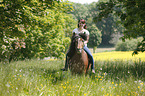 woman rides Icelandic horse